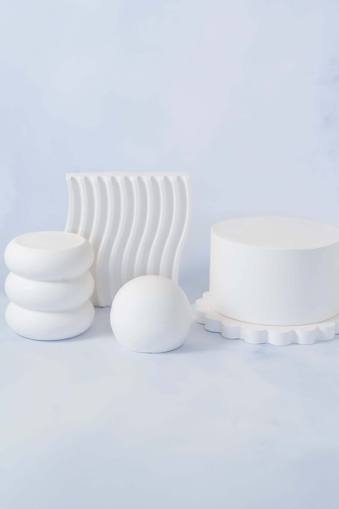 selection of white jesmonite photo props and risers | CM Props & Backdrops 