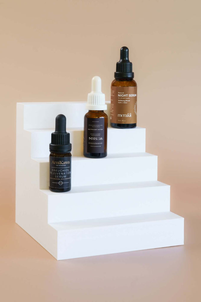 5 Step Stair Photography Prop displaying skincare serum bottles in an elegant arrangement for product photography.