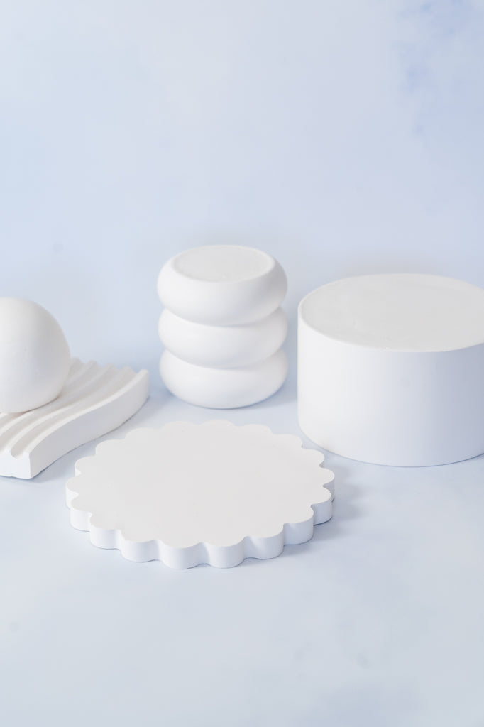 collection of white jesmonite photo props for product photography, CM Props & Backdrops 